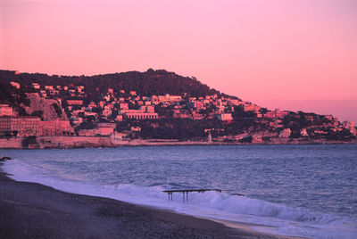 Scenic view of sea against clear sky during sunset