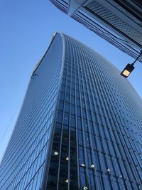 Low angle view of modern building against clear sky