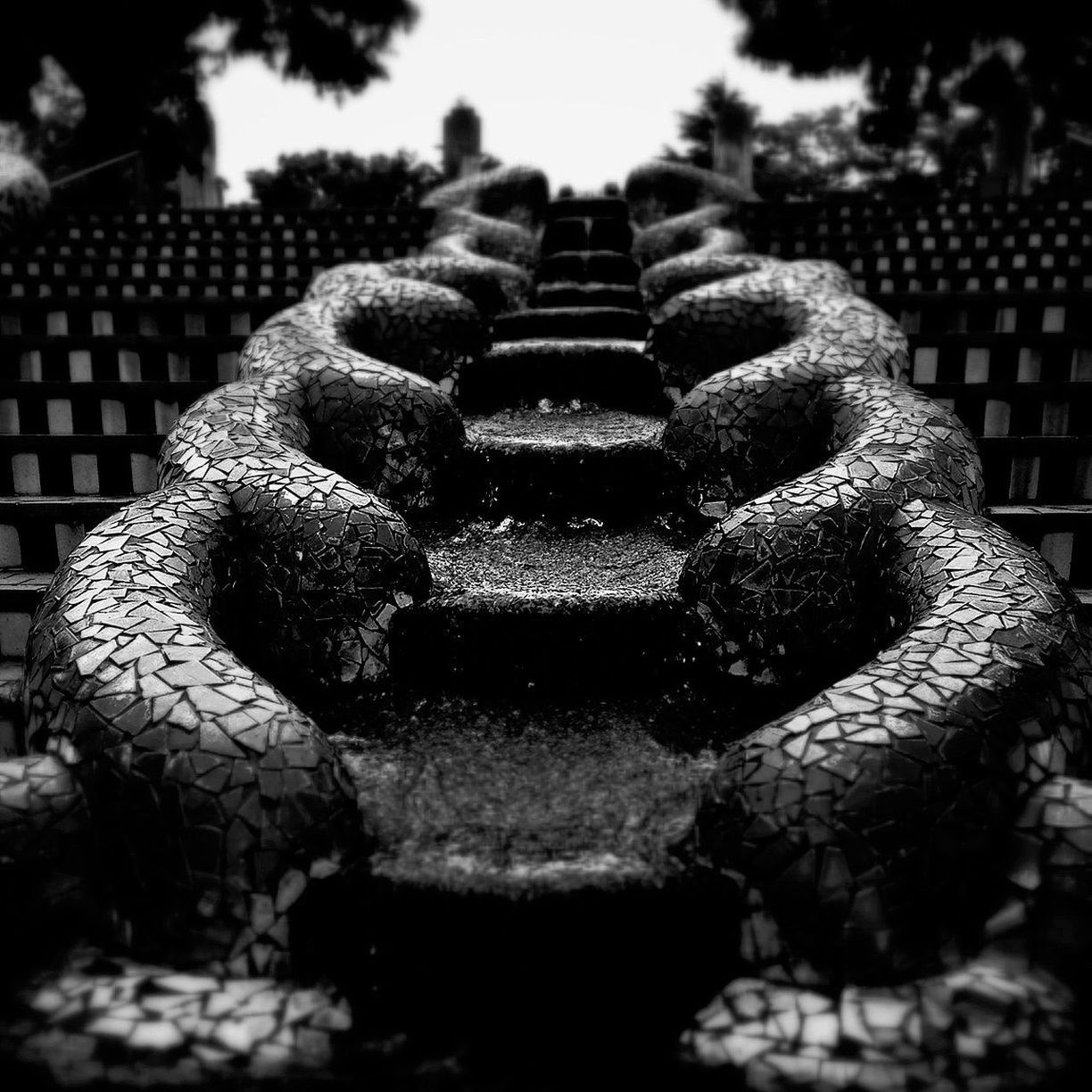 close-up, focus on foreground, pattern, art and craft, art, textured, carving - craft product, creativity, stone material, built structure, selective focus, sculpture, day, old, sunlight, architecture, no people, history, stack, in a row