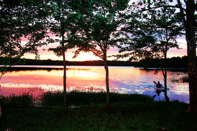 Scenic view of lake against sky during sunset