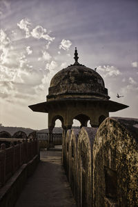 Top indian tomb style architecture view of public art museum before cloudy sky in jaipur, rajasthan