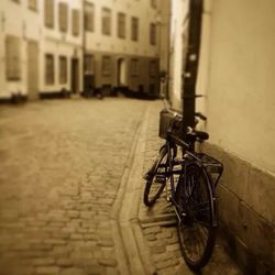 Bicycles parked in front of wall