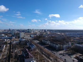 High angle view of buildings in city against sky