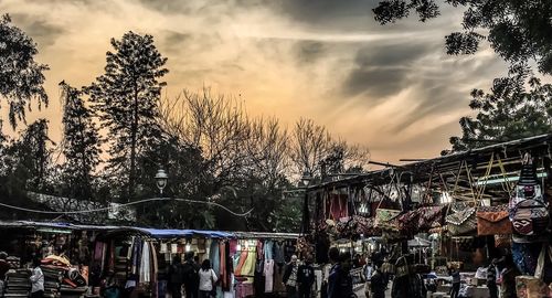 Panoramic view of people at sunset