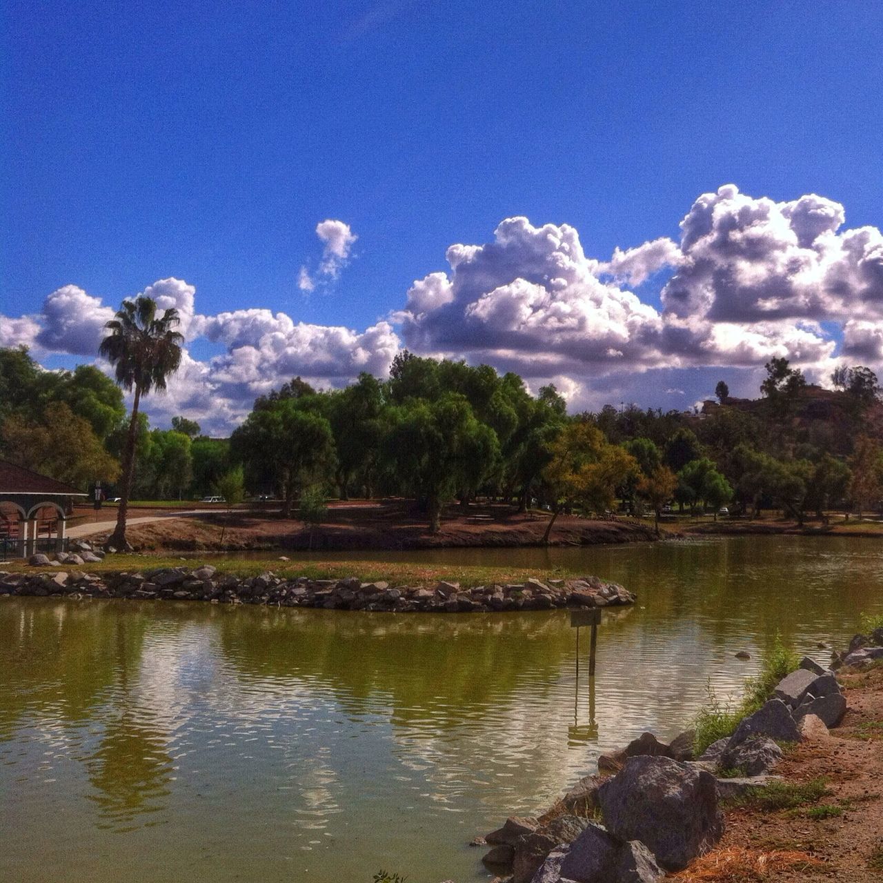 water, sky, lake, tranquil scene, tranquility, tree, scenics, reflection, beauty in nature, blue, nature, cloud - sky, cloud, idyllic, lakeshore, river, non-urban scene, day, calm, waterfront