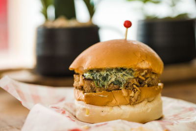 Close-up of burger on table