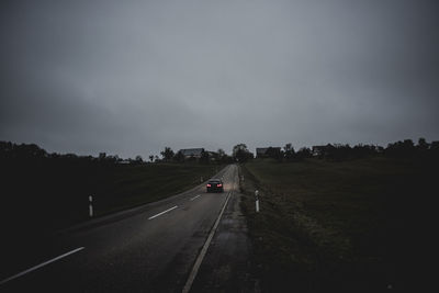 Highway against sky at dusk