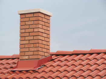 Smokes stack on house roof