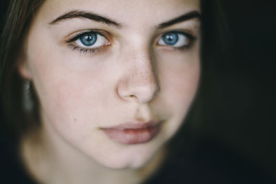 Close-up portrait of young woman
