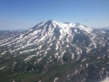 Scenic view of mountains against clear sky