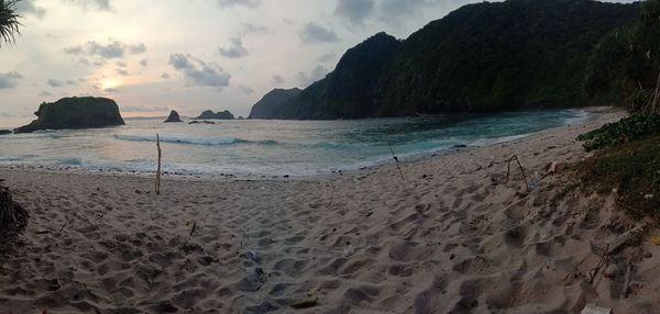 Scenic view of beach against sky