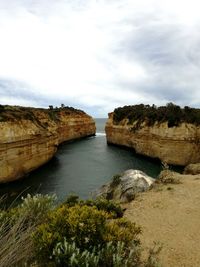 Scenic view of sea against cloudy sky