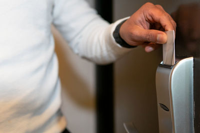 Close-up of man holding hands