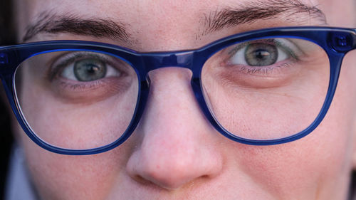 Portrait of woman with hazel eyes wearing eyeglasses