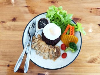 High angle view of breakfast served on table