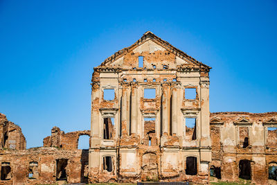 View of historical building against blue sky