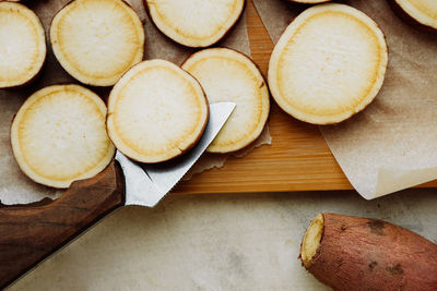 High angle view of bread on cutting board