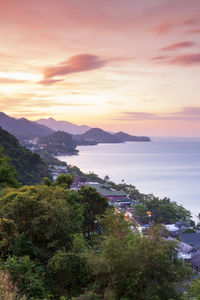 High angle view of sea against sky during sunset