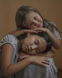 Portrait of mother and baby girl
