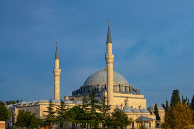 View of buildings against blue sky