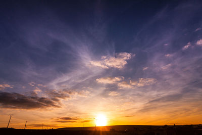 Sun shining over landscape