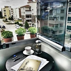 View of buildings through window