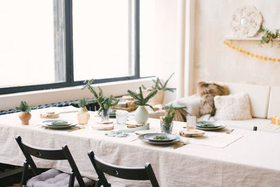 Christmas dining table for a family dinner or dinner decorated for the new year