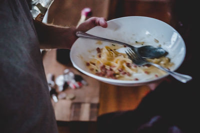 Close-up of woman eating food