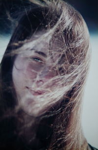 Close-up portrait of young woman