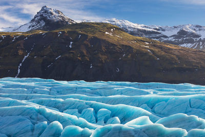 Scenic view of snowcapped mountains