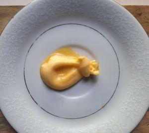 High angle view of egg in plate on table