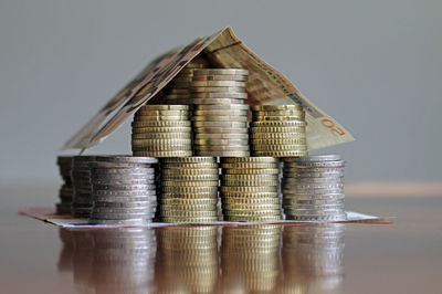 Close-up of coins on table