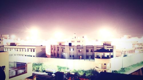 High angle view of illuminated city at night