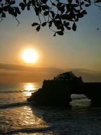 Scenic view of sea against sky at sunset