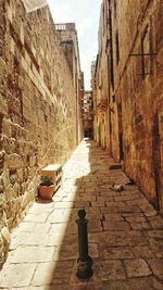 Narrow alley along buildings