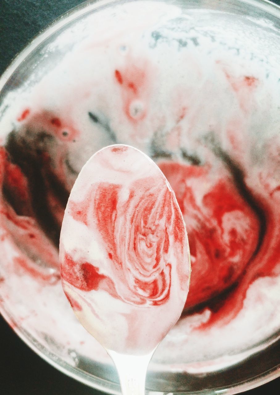 CLOSE-UP OF ICE CREAM IN GLASS CONTAINER