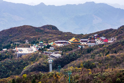 High angle view of townscape against mountains