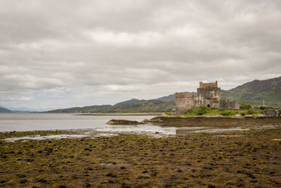 Scenic view of old castle against sky