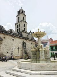 Low angle view of statue against sky