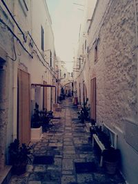 Narrow alley along buildings