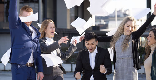 Group of business colleagues standing in city
