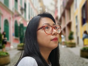 Portrait of young woman outdoors