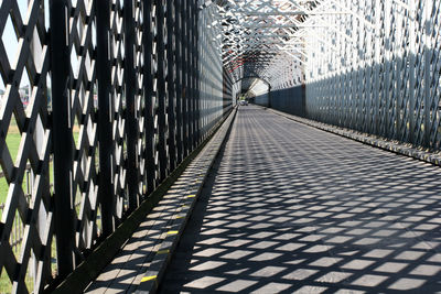 Shadow of bridge against sky