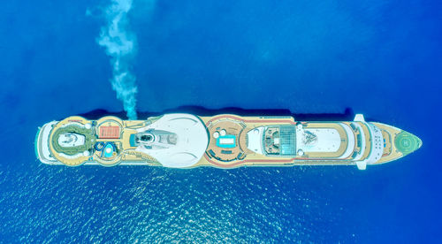 High angle view of information sign by sea