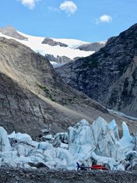 Scenic view of snowcapped mountains against sky