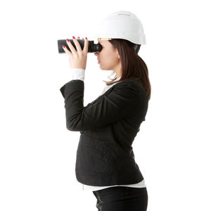 Side view of a beautiful young woman over white background
