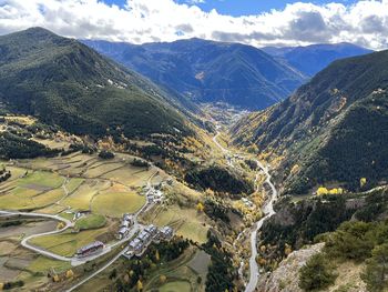 High angle view of trees and mountains against sky