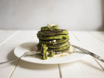 Vegan spinach pancakes on a plate