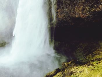 Close-up of waterfall against trees