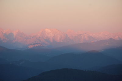 Scenic view of mountains against sky during sunset